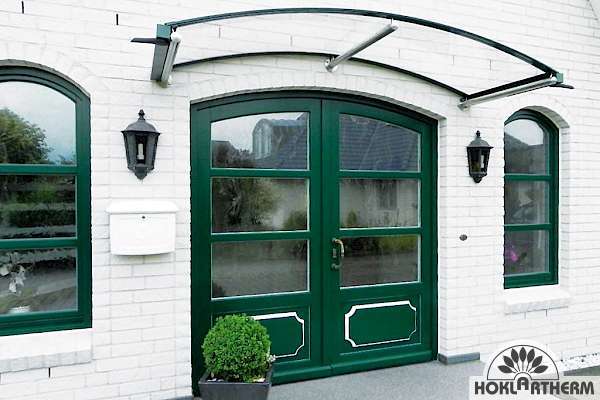 Round arch canopy in green for the front door