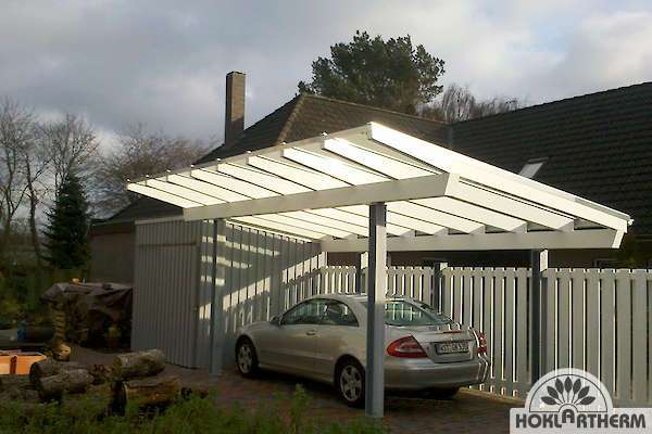 Sloped carport with car